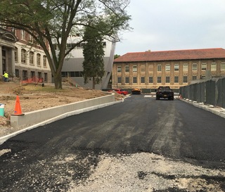 A new asphalt road has been paved for the Quad 2 Parking Lot beside Slocum Hall. Photo taken July 7, 2016