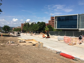Concrete has been poured along University Place to complete the foundation of the promenade. The university expects the project to be complete one week before classes start. Photo taken Aug. 3, 2016